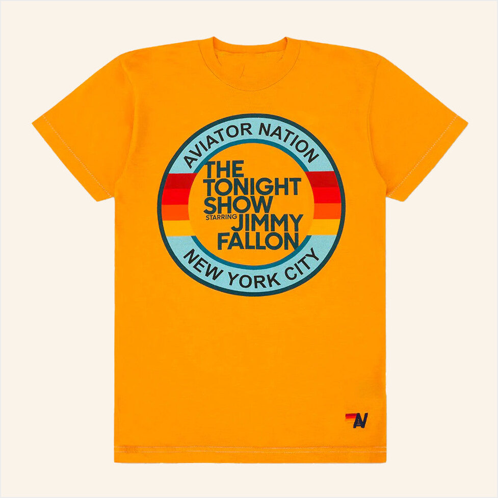 NBC Merch The Tonight Show Starring Jimmy Fallon X Aviator Nation Golden T-Shirt Gifts-1 NBC Merch The Tonight Show Starring Jimmy Fallon X Aviator Nation Golden T-Shirt Gifts-1